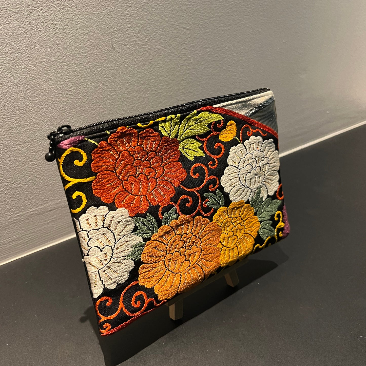 Elegant Black Pouch with Vibrant Peony Design(001-P)